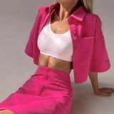 This stylish set is perfect for the summer season. It features a hot pink hue that will make you stand out, and the mini skirt that goes with it is sure to turn heads. Stay fashionable and on-trend with this elegant two-piece set.